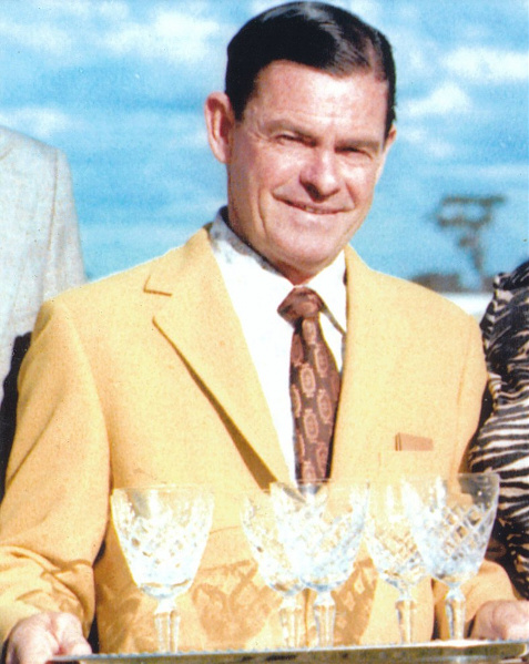 Tiger Moore accepts trophy